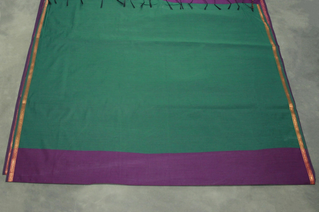 Maheswari Silk Cotton Saree in Purple with Small Butta and Zari Border