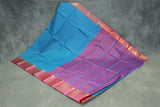 Peacock Blue Emboss Satin Border Semi Silk Saree with Floral Design and Blouse Piece