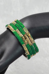 Multicolour crystal bangles set with vibrant bead detailing and gold-tone sparkle, perfect for festive wear, weddings, and mix-and-match eth