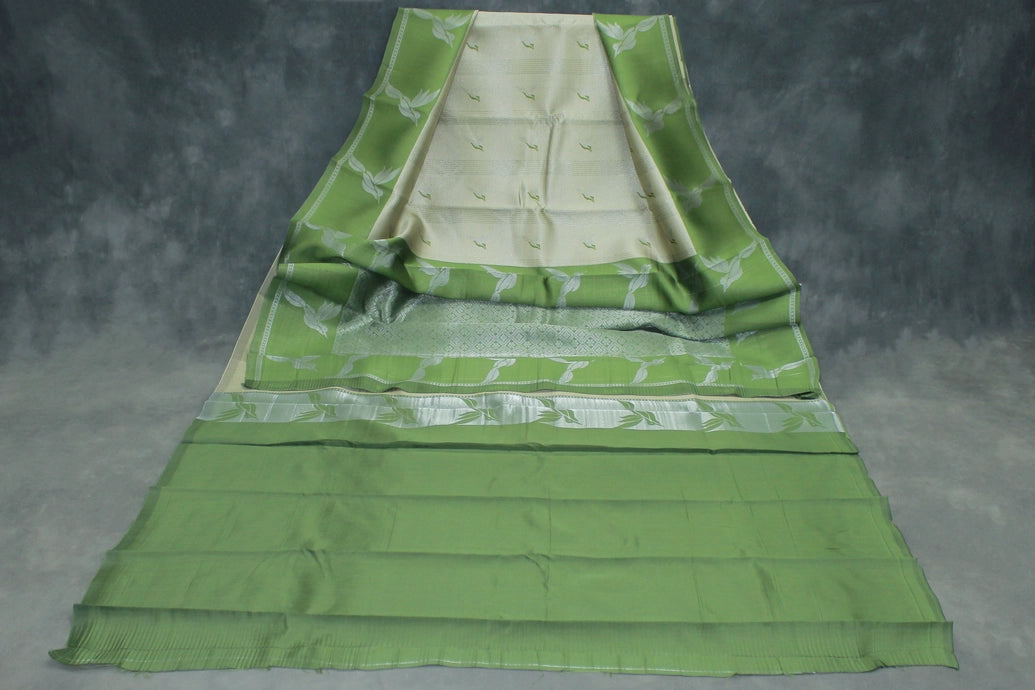 Beige & Green Kubera Silk Pattu Saree with Zari Border and Bird Design Blouse