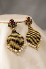 Maroon Stone Gold-Tone Jhumka Earrings with Pearl Beads for Traditional Festive Wear