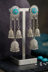 Silver-Finish Flower Stud Jhumka Earrings with Multicolor Crystal Stones and Filigree Dome Drop