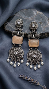 Cream Stone & Silver-Tone Textured Triangular Drop Earrings with Pearl Beads for Festive Party Wear