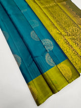 Yellow & Teal Soft Silk Saree with Contrast Border and Zari-Style Details for Women