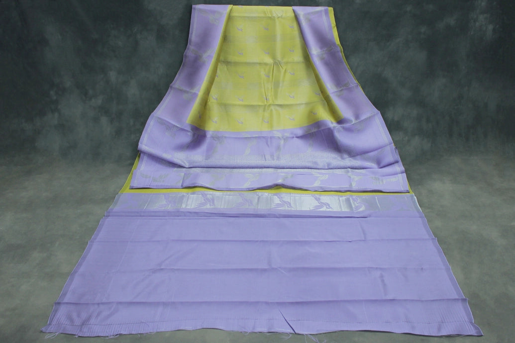 Pastel Yellow Kubera Silk Pattu Saree with Zari Border and Bird Design, Includes Blouse