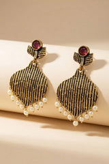 Maroon Stone Gold-Tone Jhumka Earrings with Pearl Beads for Traditional Festive Wear