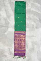 Green Semi Soft Silk Saree with Purple Contrast Border, Gold Zari Buttas & Traditional Floral Border