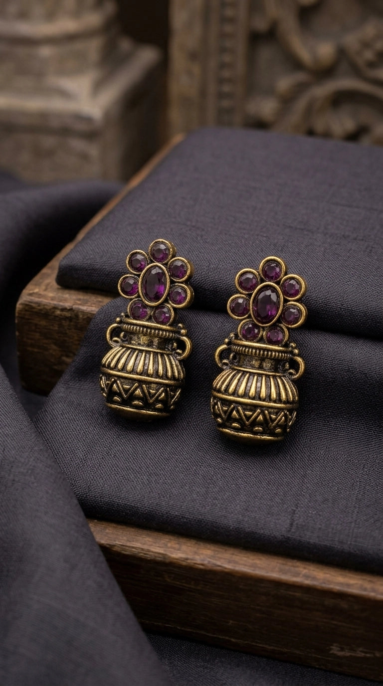 Purple Floral Jhumka Earrings in Antique Gold Finish with Crystal Stud Pattern for Traditional Festive Wear