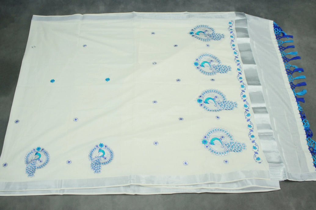 Half White Kerala Cotton Saree with Peacock Embroidery and Silver Zari Thread Work