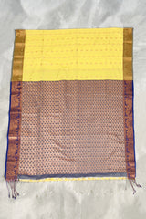 Yellow Semi Soft Silk Saree with Contrast Border, Gold Zari Buttas and Traditional Floral Zari Border