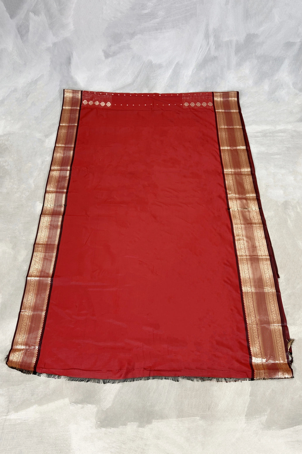 Maroon Pure Silk Saree with Heavy Pallu and Border and Contrast Gold Toned Weave