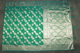 Green Banarasi Silk Saree with Zari Floral Motifs and Rich Contrast Border, Tassels, Comes with Blouse