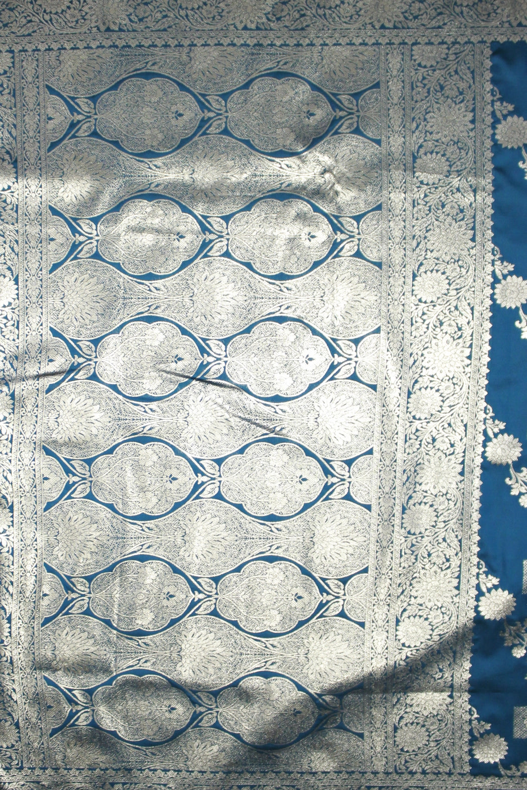 Blue Banarasi Soft Silk Saree with Zari Floral Motifs Border and Opulent Pallu Tassels