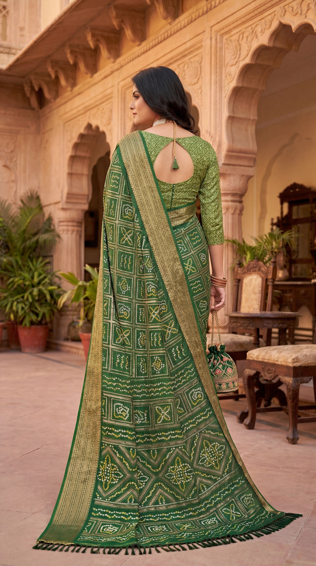 Dark Olive Green Chiffon Bandhani Print Saree with Gold Zari Motifs and Geometric Border for Festive Wear