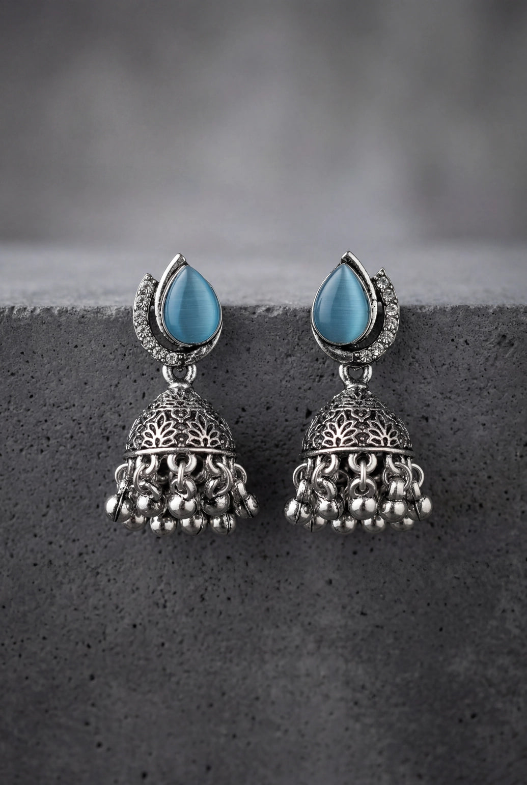 Oxidized Silver-Tone Oval Stone Jhumka Earrings with Floral Cutwork & Ghunghroo Beads