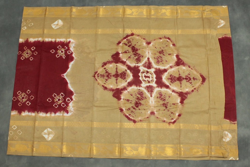 Maroon Sungudi Cotton Bandhani Saree with Golden Zari Border and Traditional Instrument Motifs, Unstitched Blouse Included Saree JCS Fashions