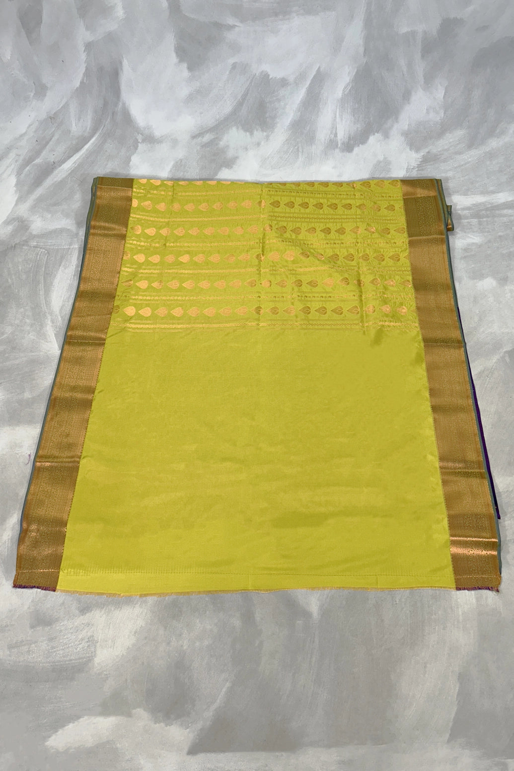 Orange Soft Silk Saree with Delicate Gold Zari Buttas and Floral Border