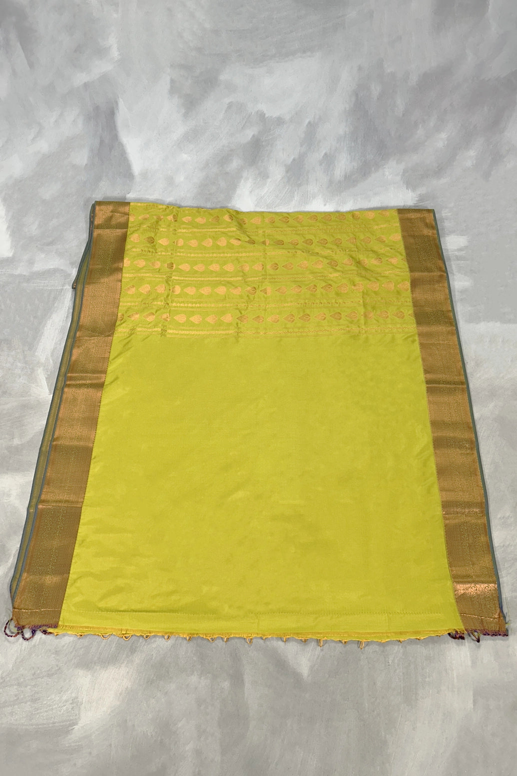 Lime Green Korvai Soft Silk Saree with Delicate Gold Zari Buttas and Traditional Floral Border
