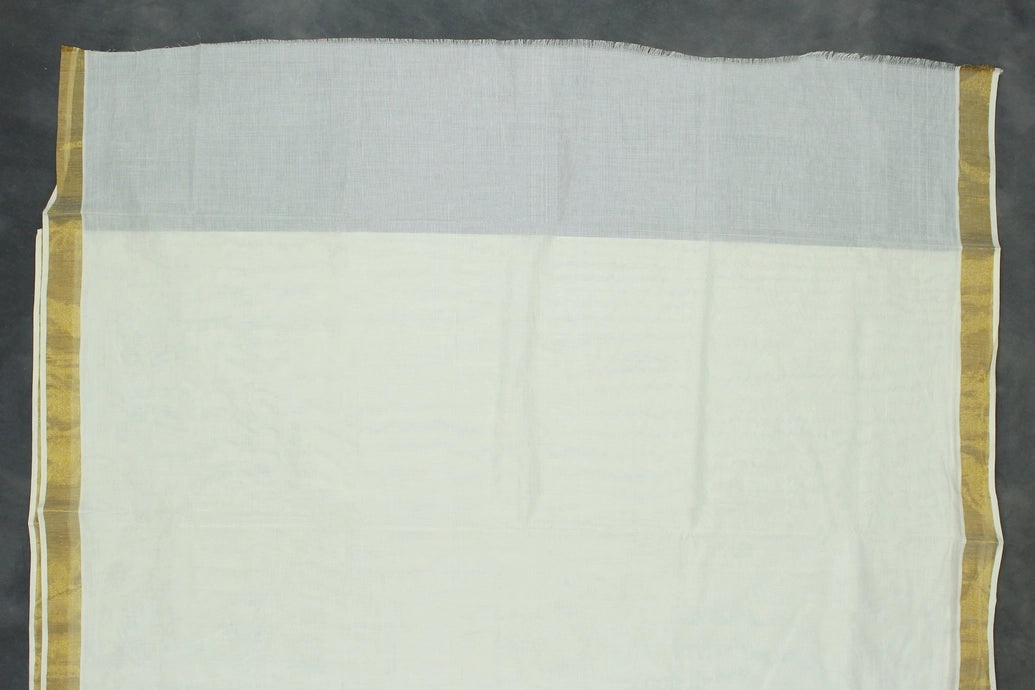 Fabric: Pure Kerala Cotton – lightweight, breathable, 
        •        Design: Rich machine embroidery in Gold zari and thread with detaile