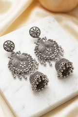 Oxidized Black Silver Jhumka Earrings with Floral Leaf Engraving and Dangling Beads for Traditional Wear