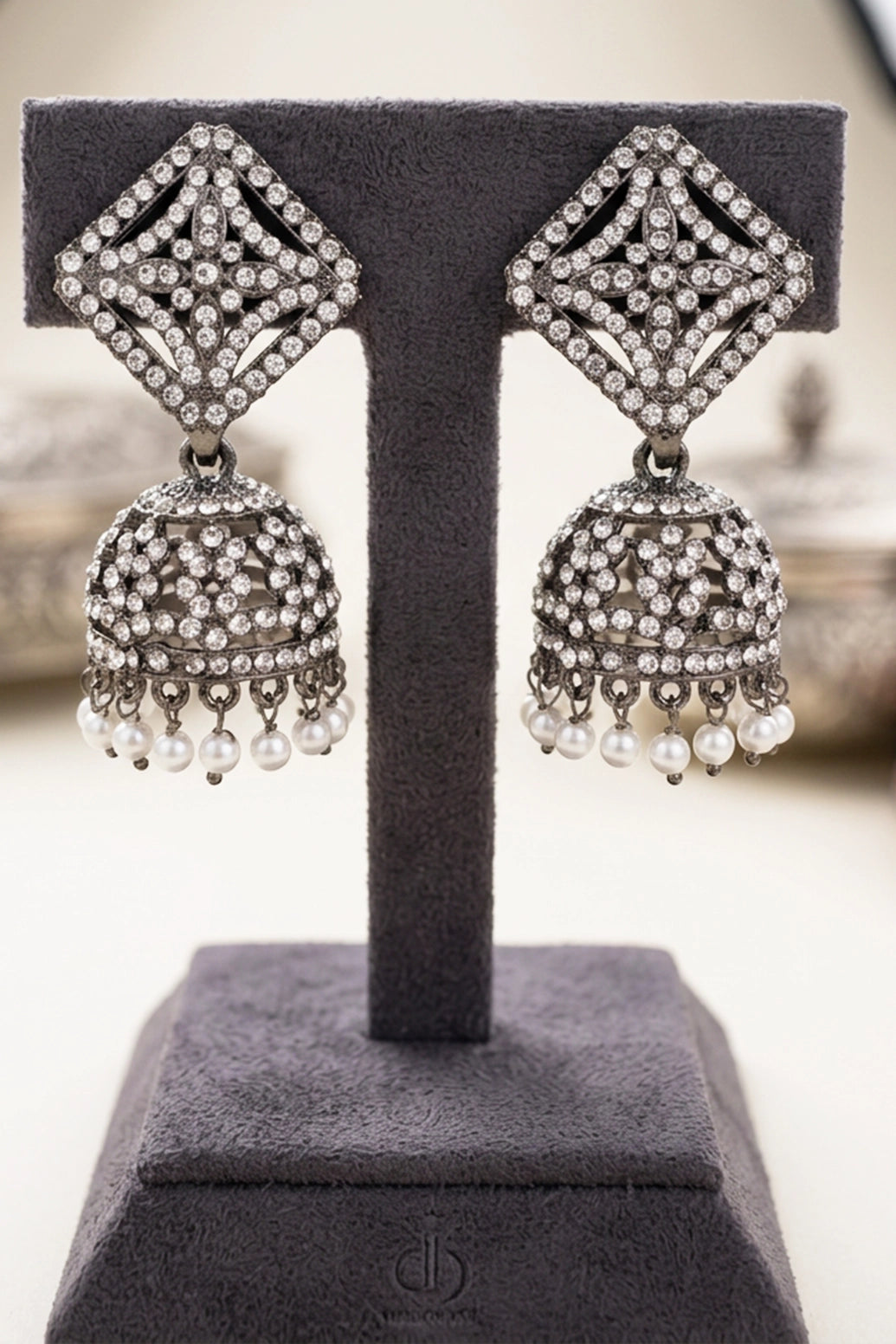 Oxidized Black-Silver Square Jhumka Earrings with Sparkling Stones and Pearl Drop Tassels