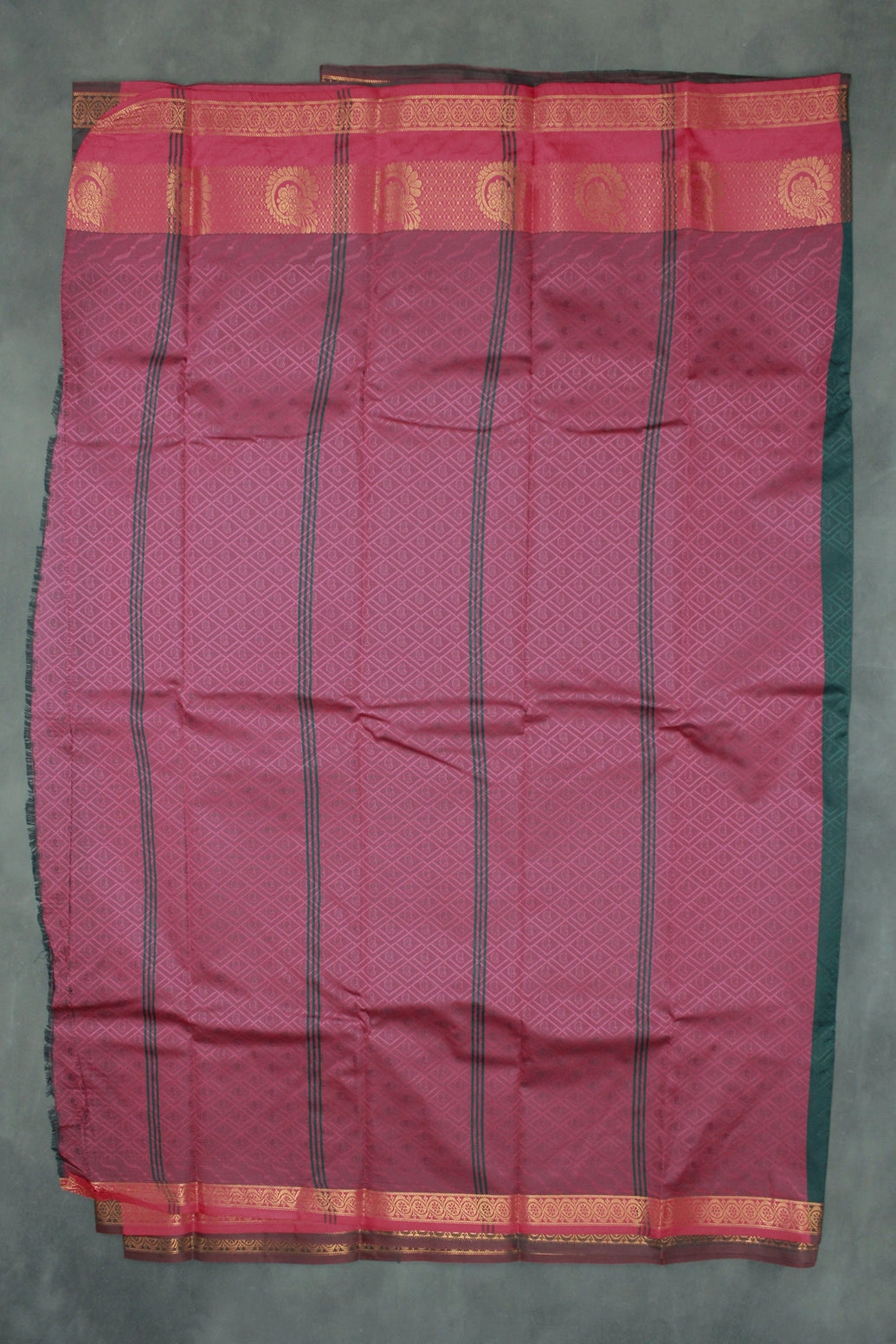 Dark Green Emboss Silk Saree with Traditional Border Design