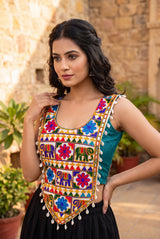 Kutchi Mirror-Work Navratri Blouse with Elephant Motif and Cowrie Border, Sleeveless Ethnic Wear for Women