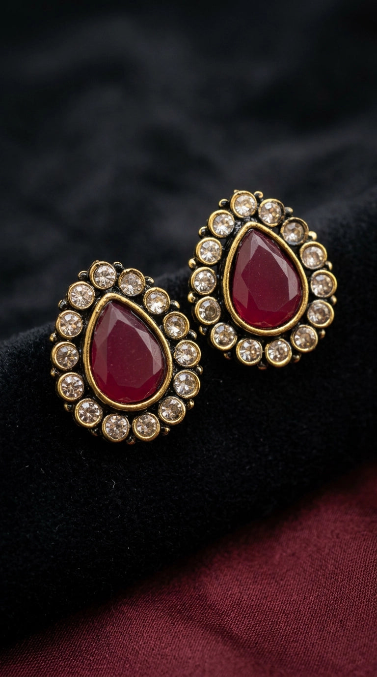 Red Teardrop Stud Earrings With Gold-Tone Halo And Clear Crystal Accents For Festive Wear