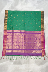 Green Semi Soft Silk Saree with Purple Contrast Border, Gold Zari Buttas & Traditional Floral Border