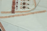 Fabric: Pure Kerala Cotton – lightweight, breathable, 
        •        Design: Rich machine embroidery in Copper zari and thread with detai