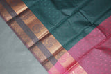 Dark Green Emboss Silk Saree with Traditional Border Design