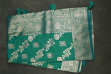 Green Banarasi Silk Saree with Zari Floral Motifs and Rich Contrast Border, Tassels, Comes with Blouse