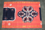 Pure Sungudi Cotton Bandhani Saree with Golden Zari Instrument Motif Border — Navy Blue & Coral, Unstitched Blouse Included Saree JCS Fashions