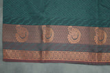 Dark Green Emboss Silk Saree with Traditional Border Design