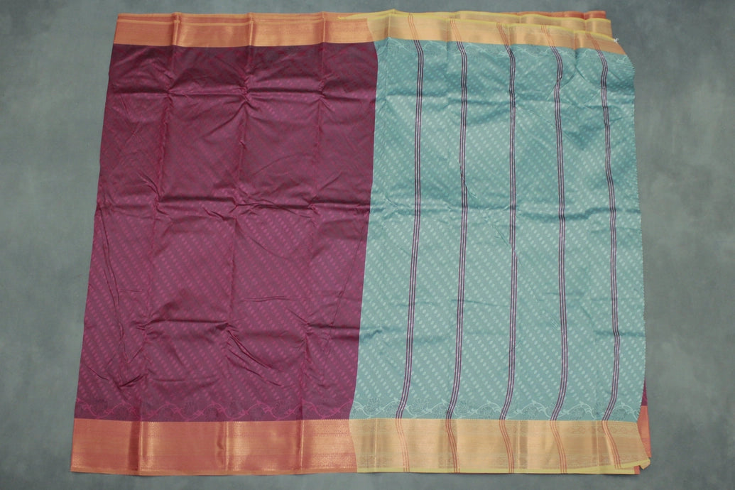 Maroon Emboss Silk Saree with Contrast Zari-Style Border and Semi Silk Design