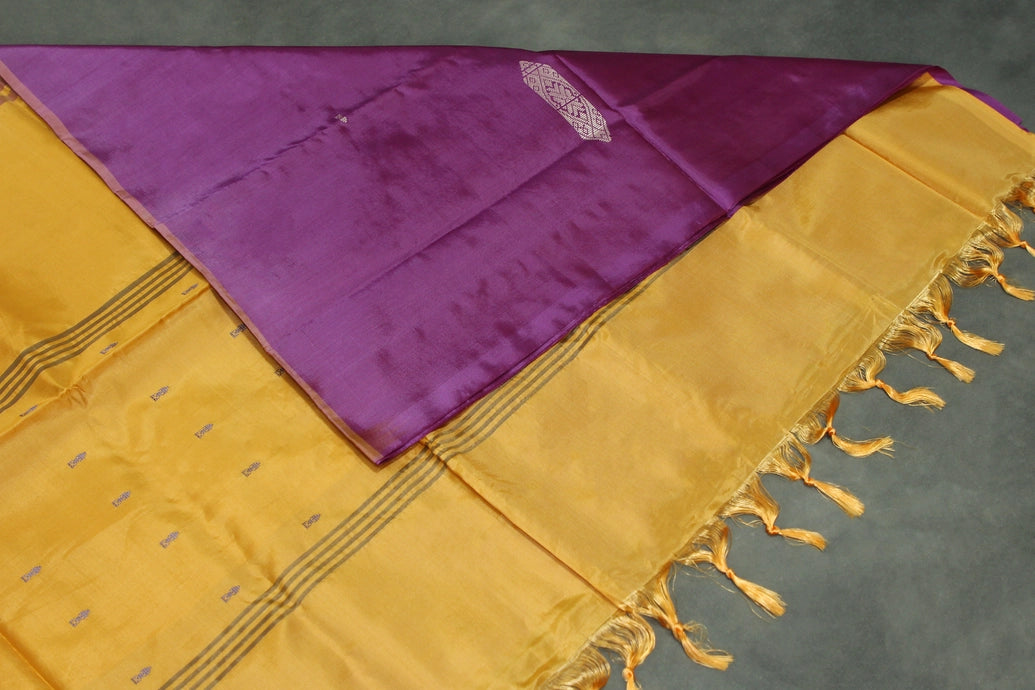 Vaazhai Naar (Banana Pith) Orange Borderless Saree with Purple Pallu and Small Buttas