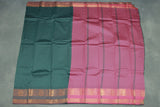 Dark Green Emboss Silk Saree with Traditional Border Design