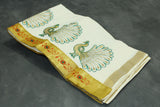 Fabric: Pure Kerala Cotton – lightweight, breathable, 
        •        Design: Rich machine embroidery in Gold zari and thread with detaile