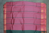 Dark Green Emboss Silk Saree with Traditional Border Design