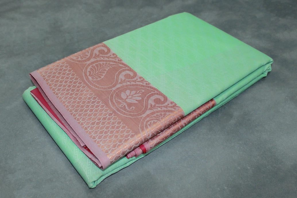 Mint Blue Emboss Silk Saree with Copper Border and Semi Silk Texture for Traditional Wear