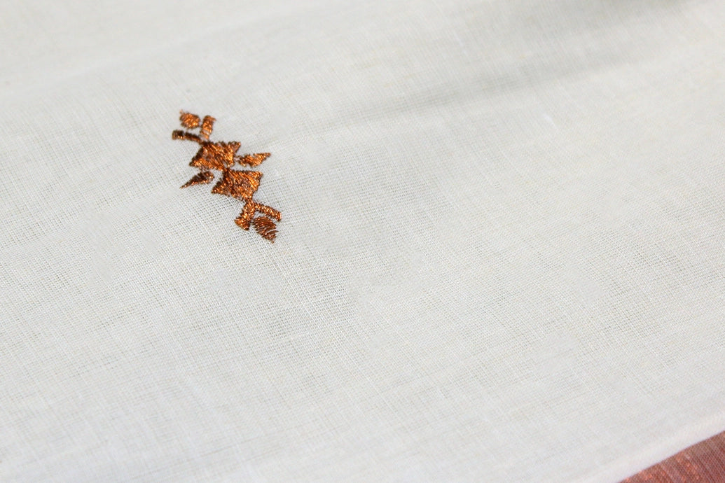 White Kerala Cotton Saree with Copper Zari Peacock Embroidery and Copper Border