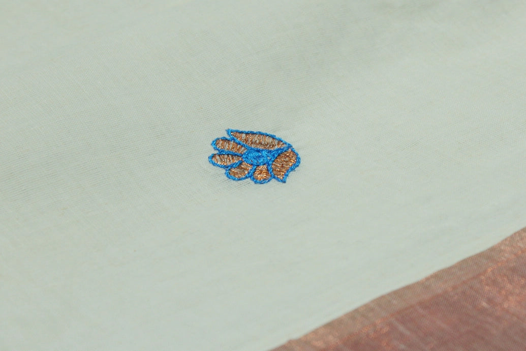 Fabric: Pure Kerala Cotton – lightweight, breathable, 
        •        Design: Rich machine embroidery in Copper zari and thread with detai