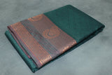 Dark Green Emboss Silk Saree with Traditional Border Design