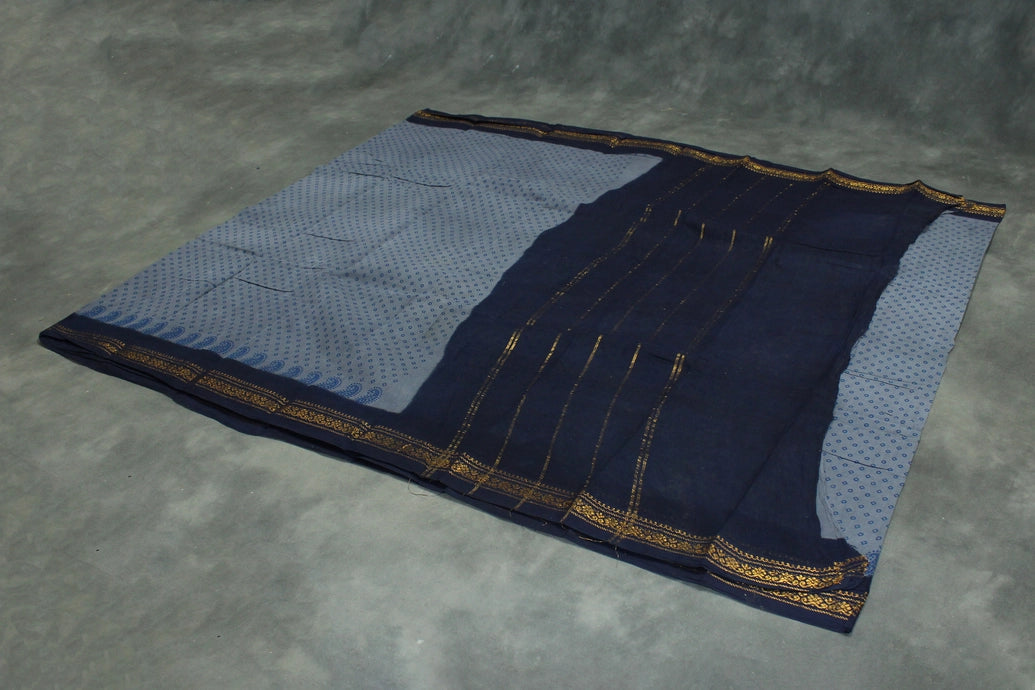 Grey Poly-Cotton Printed Saree with Navy Blue Border & Gold-Tone Motif Saree JCS Fashions