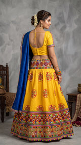Yellow Navratri Designer Chaniya Choli with Heavy Kutchi Mirror Work Choli and Contrast Plain Skirt