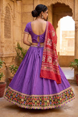 Purple Navratri Chaniya Choli Set with Kutchi Mirror Work Choli & Embroidered Border Flared Lehenga Skirt