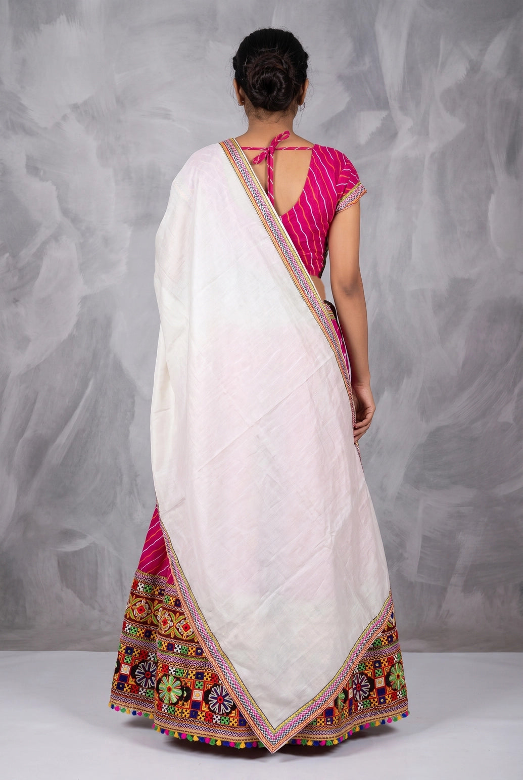 Rani Pink & White Navratri Chaniya Choli with Lehariya Print and Kutchi Mirror Border