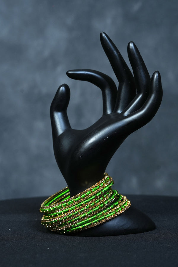 Luxury Radiance: 23 Silk Thread Bangles with Golden Bead Elegance