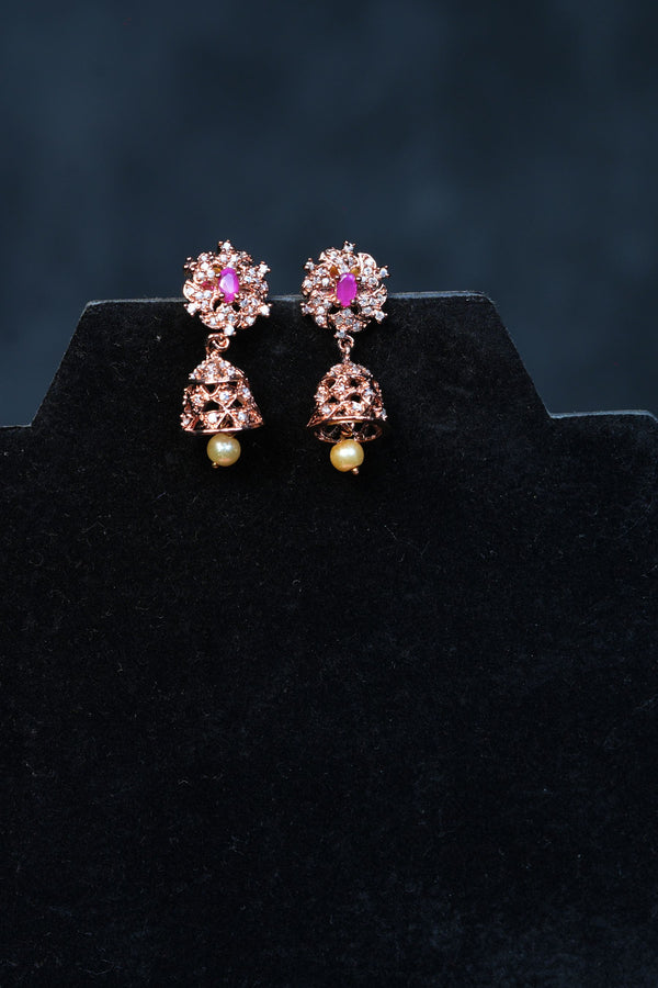 Stunning Pink and White AD Stone Jhumka Earrings with Pearl Detail
