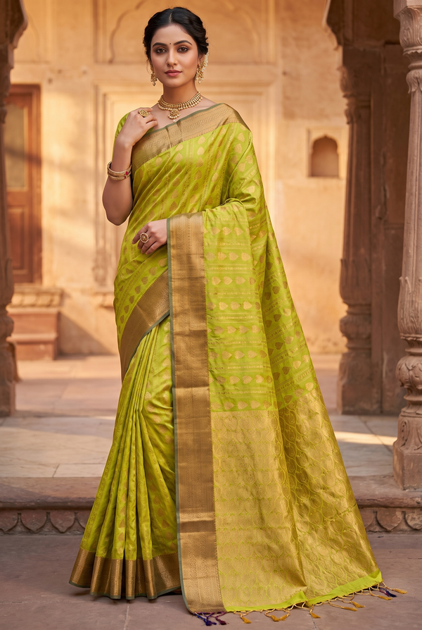 Lime Green Semi Soft Silk Saree with Delicate Gold Zari Buttas and Traditional Floral Border